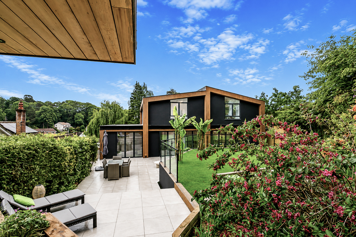 Property exterior photographed on a clear blue sky day